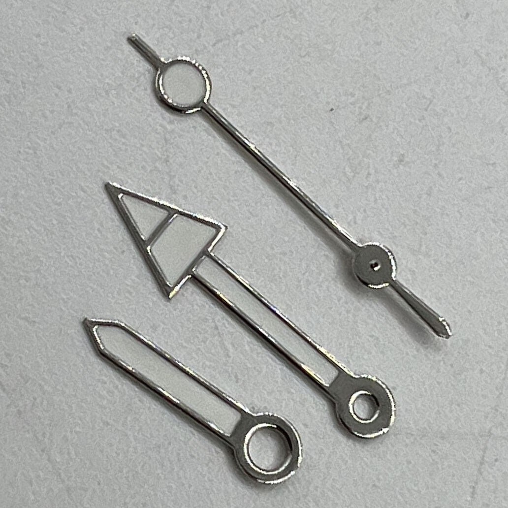 Arrow-shaped silver trim green luminous watch hands for NH35/NH36/4R/7S movement, enhancing visibility and style.