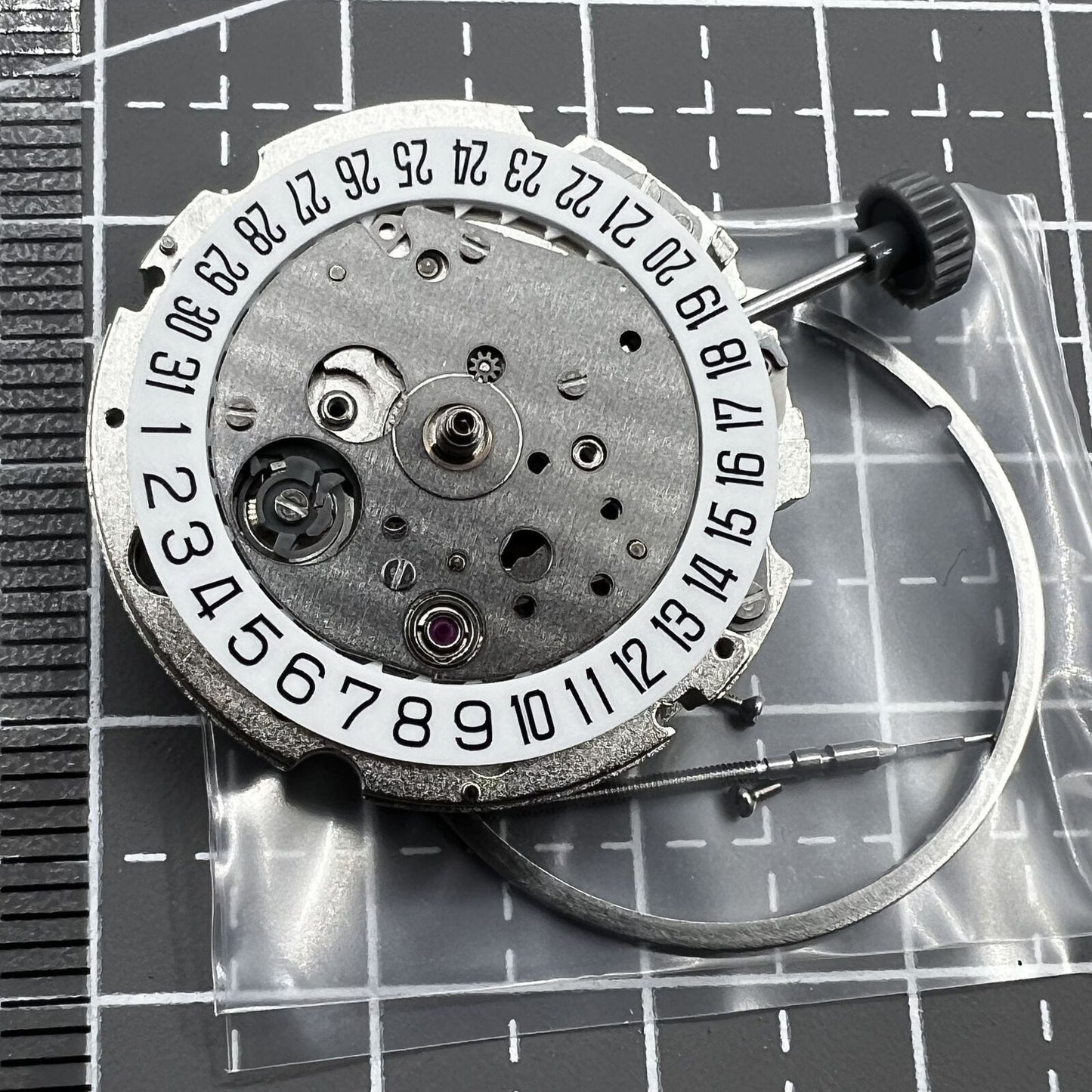 Miyota/Citizen 8215 automatic watch movement with white dial, date at 6 o'clock, perfect for watch repairs.