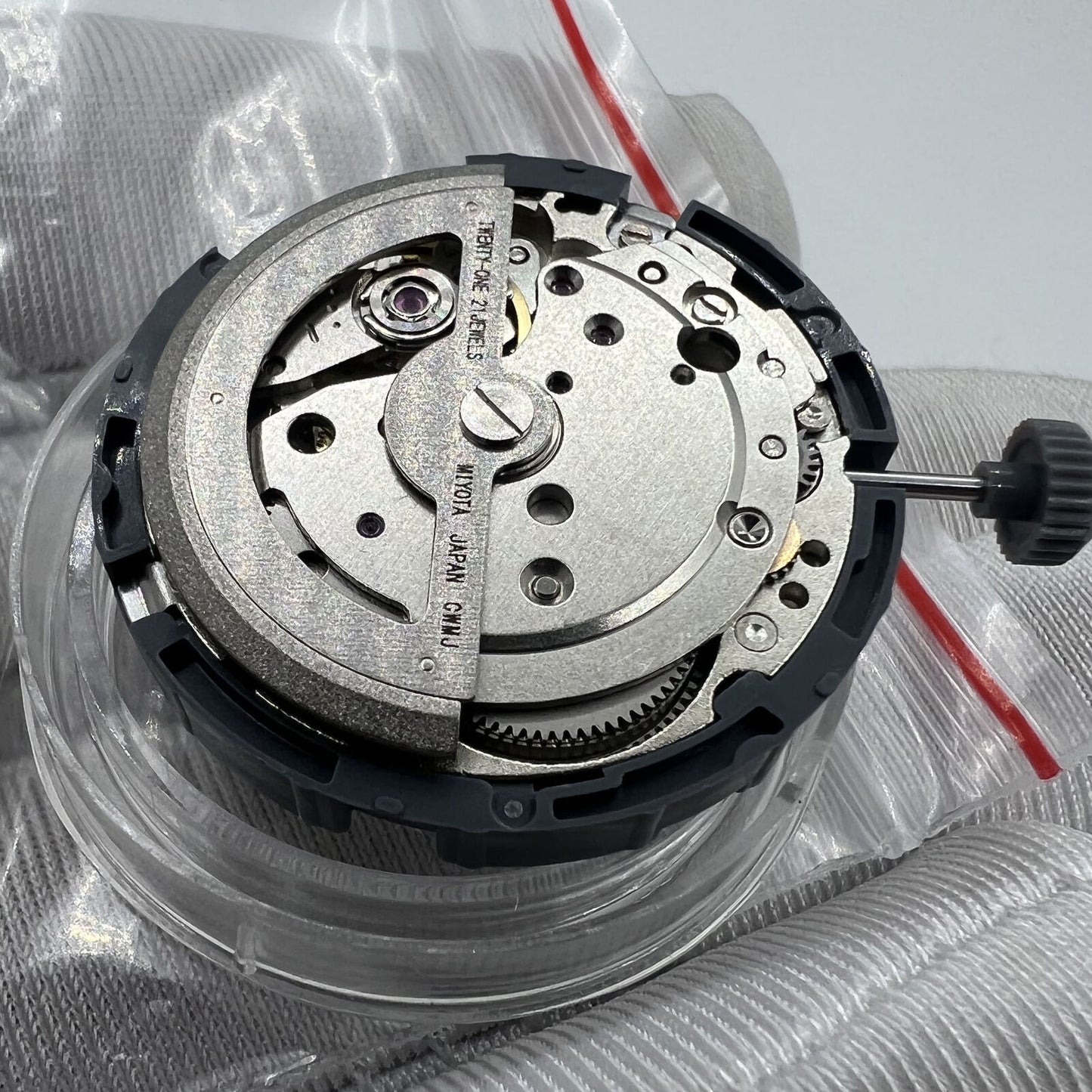 Japan Made Miyota 8285 automatic watch movement by Miyota, highlighting precise mechanical engineering.