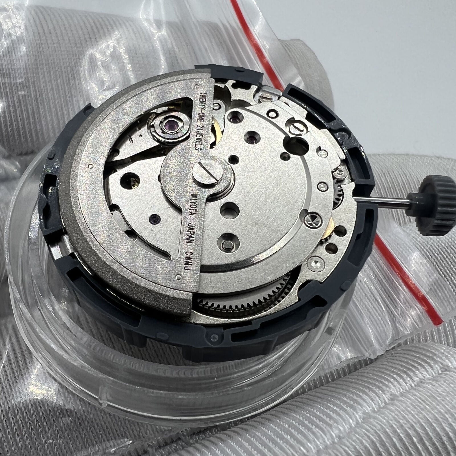 Japan Made Miyota 8285 automatic watch movement by Miyota, highlighting precise mechanical engineering.