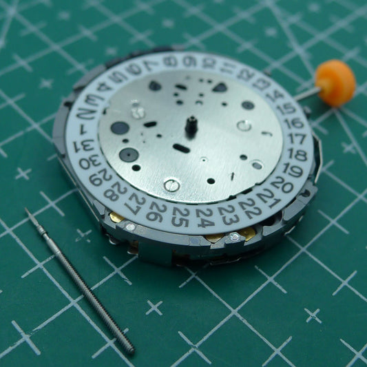 Wholesale Miyota JP11 Japan Quartz watch movement showing date display at 3 o?clock for precise timekeeping.