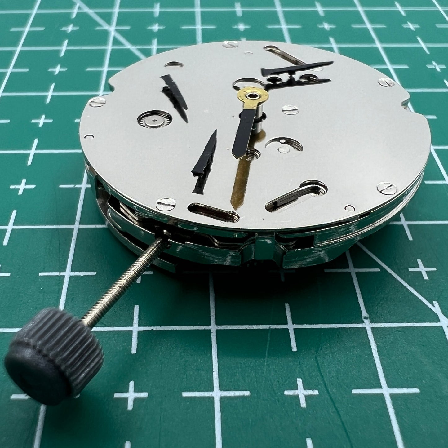Wholesale DG2813 mechanical watch movement displaying three large hands and small seconds subdial, no calendar feature.