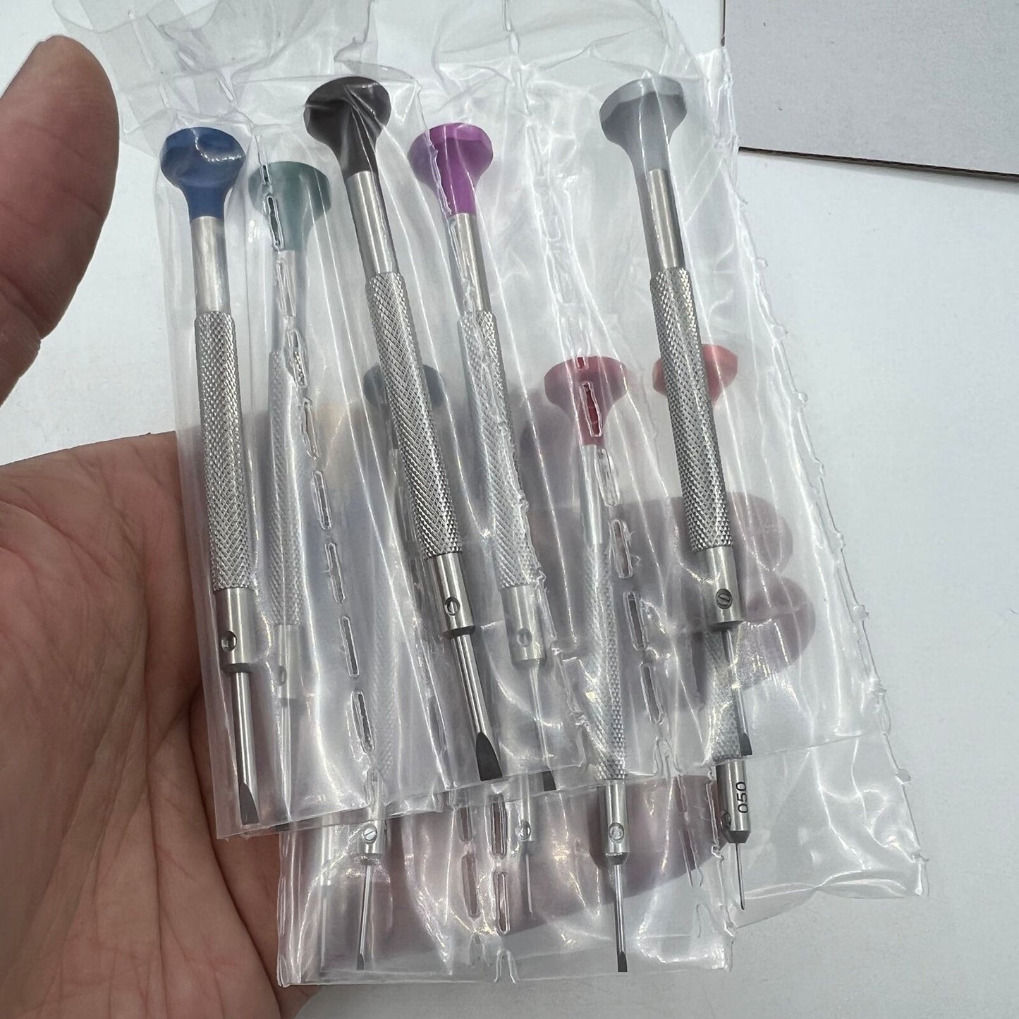 Swiss Bergeon 30081-S10 ergonomic screwdriver set with rotating stand for precise watch accessory repairs.