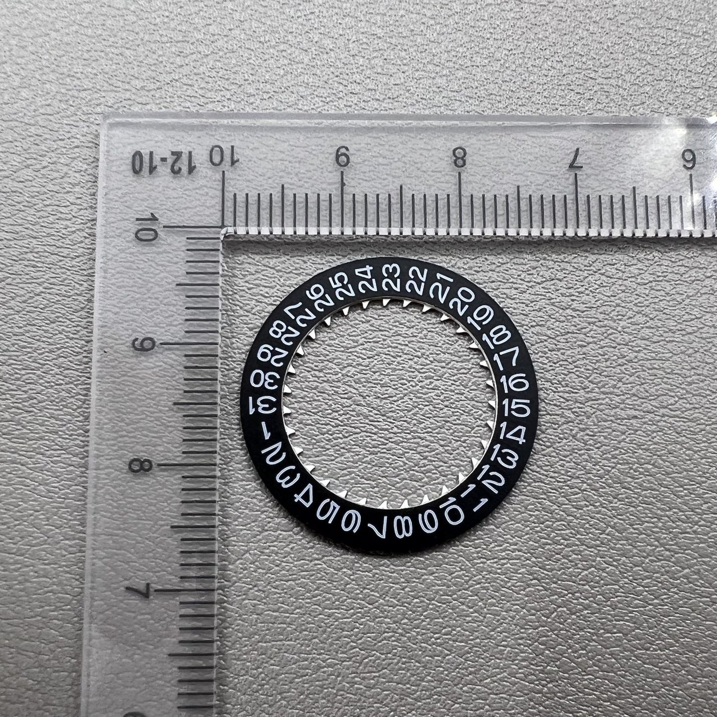 Black date disk wheel set by NH for NH35 NH36 movements, precise fit at Date@3 display on watches.
