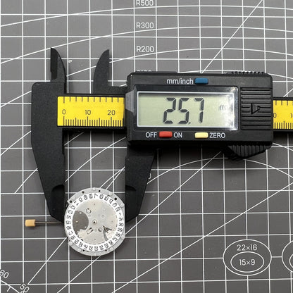 SL70 Quartz watch movement with small second subdials at 3, 6, and 9 for accurate time tracking.