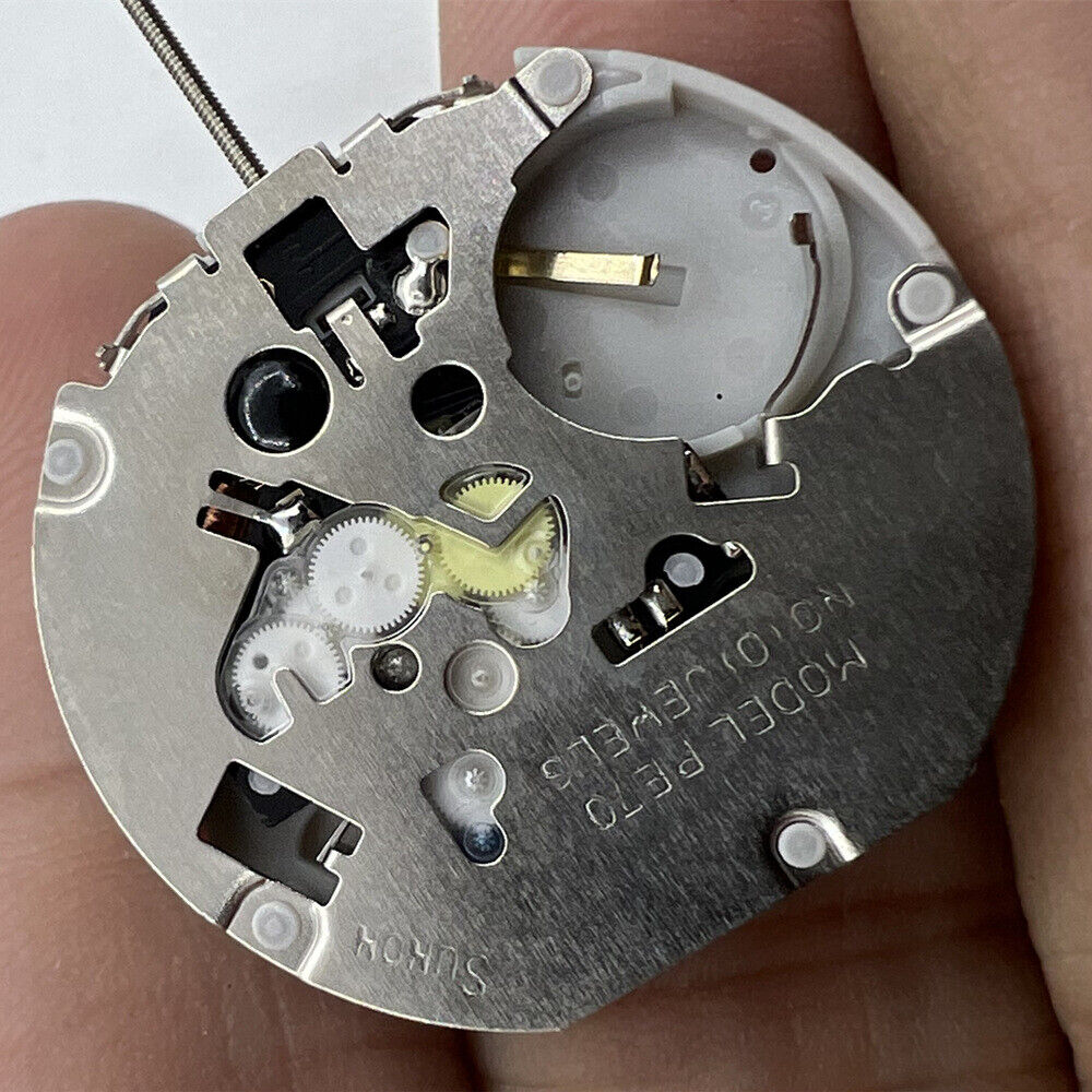 Sunon PE70 quartz watch movement with date at 3 and small seconds at 3, 6, and 9 o'clock positions