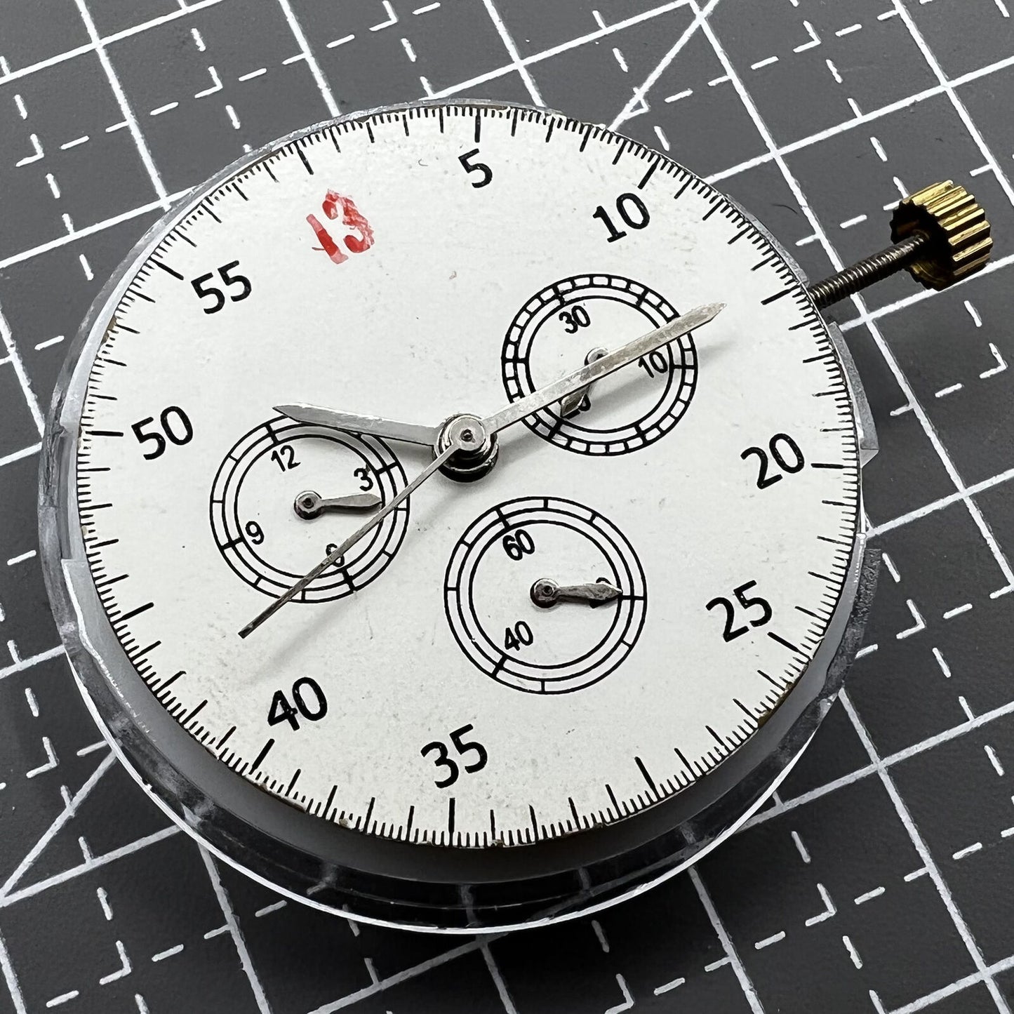 Dandong 7750 mechanical watch movement showing small seconds at 3, 6, and 9 o?clock without calendar.