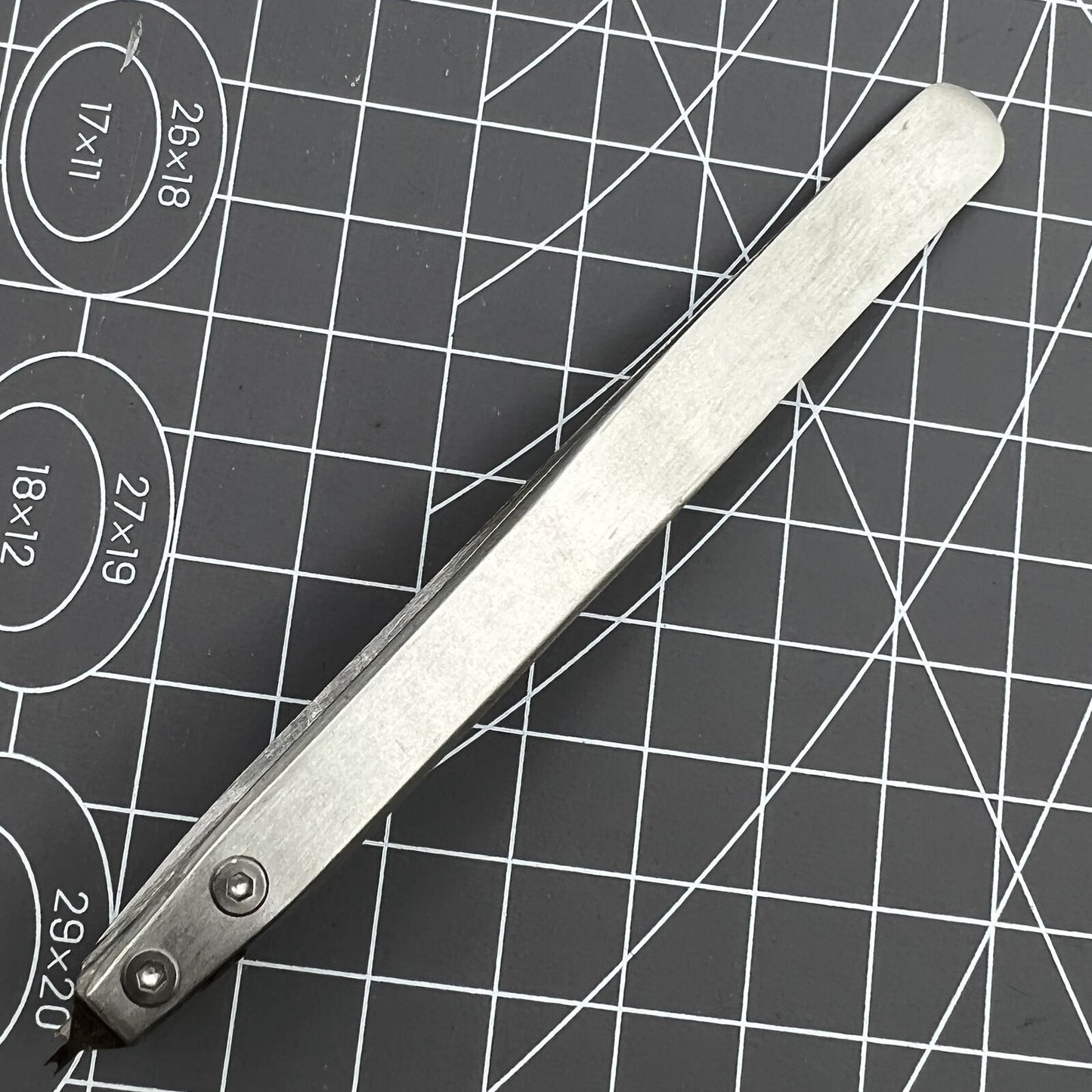 Bergeon 7825 spring bar tweezer tool for precise watch lug spring bar removal and fitting.