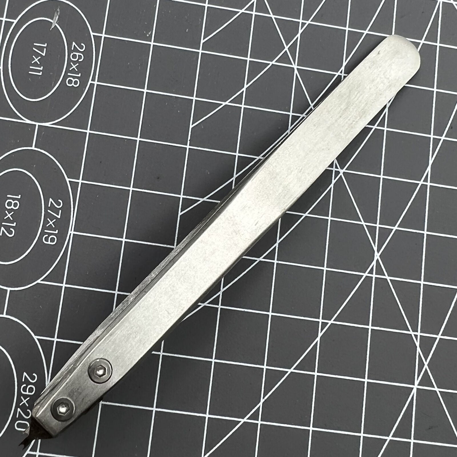 Bergeon 7825 spring bar tweezer tool for precise watch lug spring bar removal and fitting.