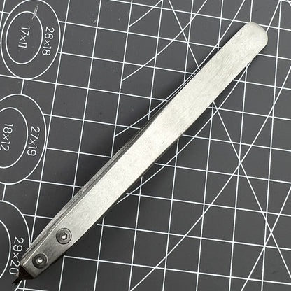 Bergeon 7825 spring bar tweezer tool for precise watch lug spring bar removal and fitting.