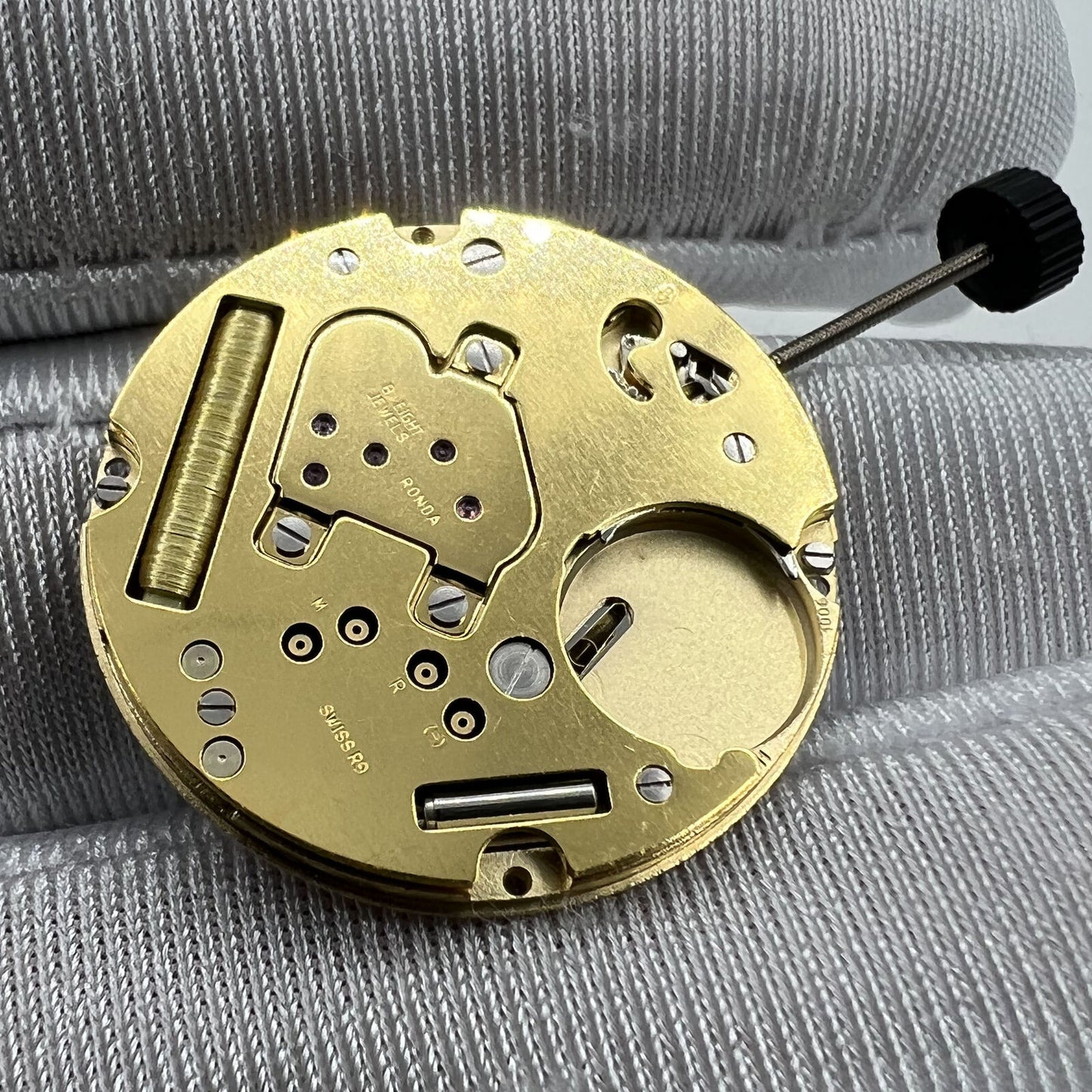 Swiss Movement Ronda 1006 Slimtech quartz watch mechanism showcasing precise timekeeping in premium accessories.