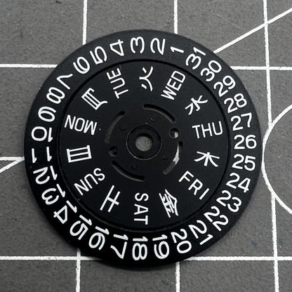 Green lume date and week wheels for NH36 movement, showing date at 3.8, precision watch accessory.