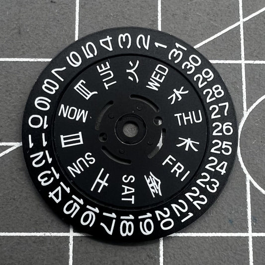 Green lume date and week wheels for NH36 movement, showing date at 3.8, precision watch accessory.