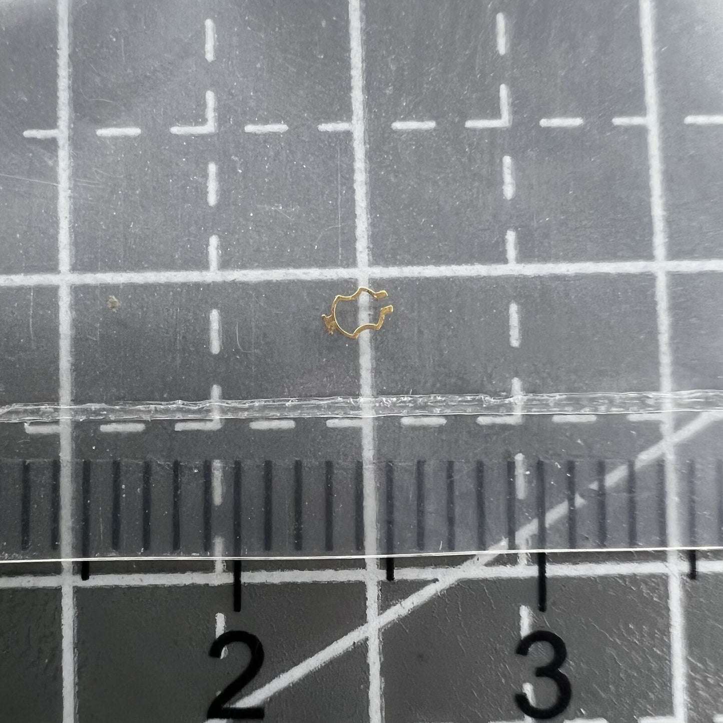 Red Plate Click Spring Cap Jewel for ETA 2892 balance wheel, precise watch accessory.