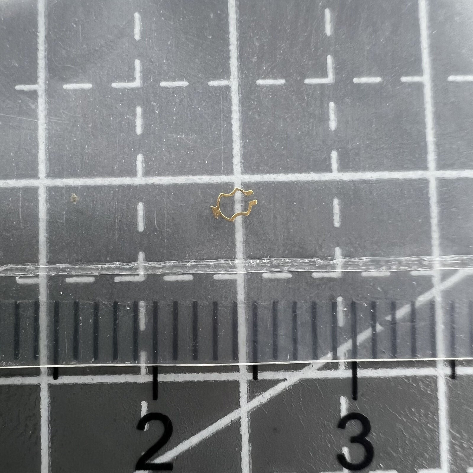 Red Plate Click Spring Cap Jewel for ETA 2892 balance wheel, precise watch accessory.