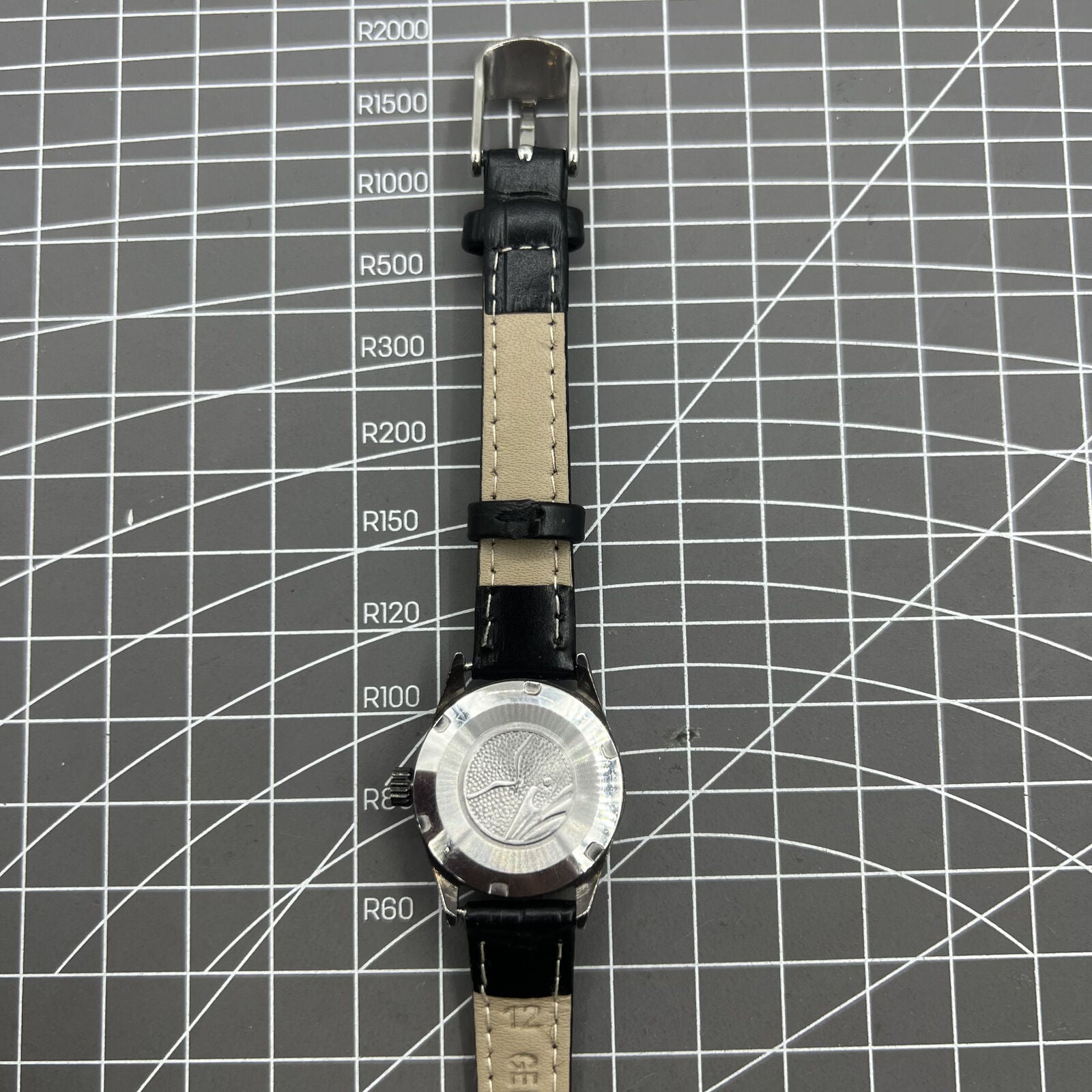 27mm Tianjin Seagull ladies watch with manual movement, gold nail hour markers, elegant accessory.