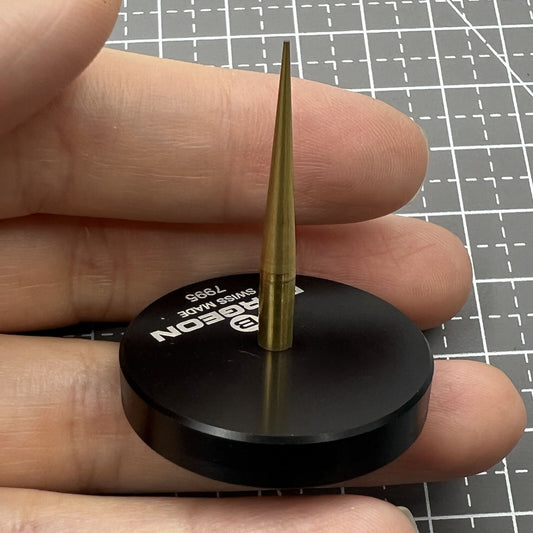 Swiss Bergeon 7995 balance cock holding support tool for precise watch repair and assembly.
