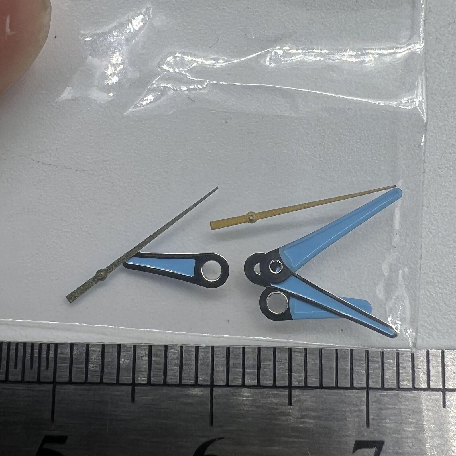 Set of 13mm, 11mm, and 9mm blue painted watch hands for Miyota 2035 movement, sleek design.