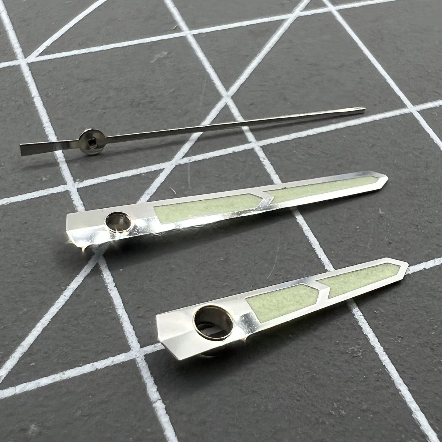 Green luminous watch hands designed for China Made 8215/2813/Miyota 8N24 movement, enhancing visibility.