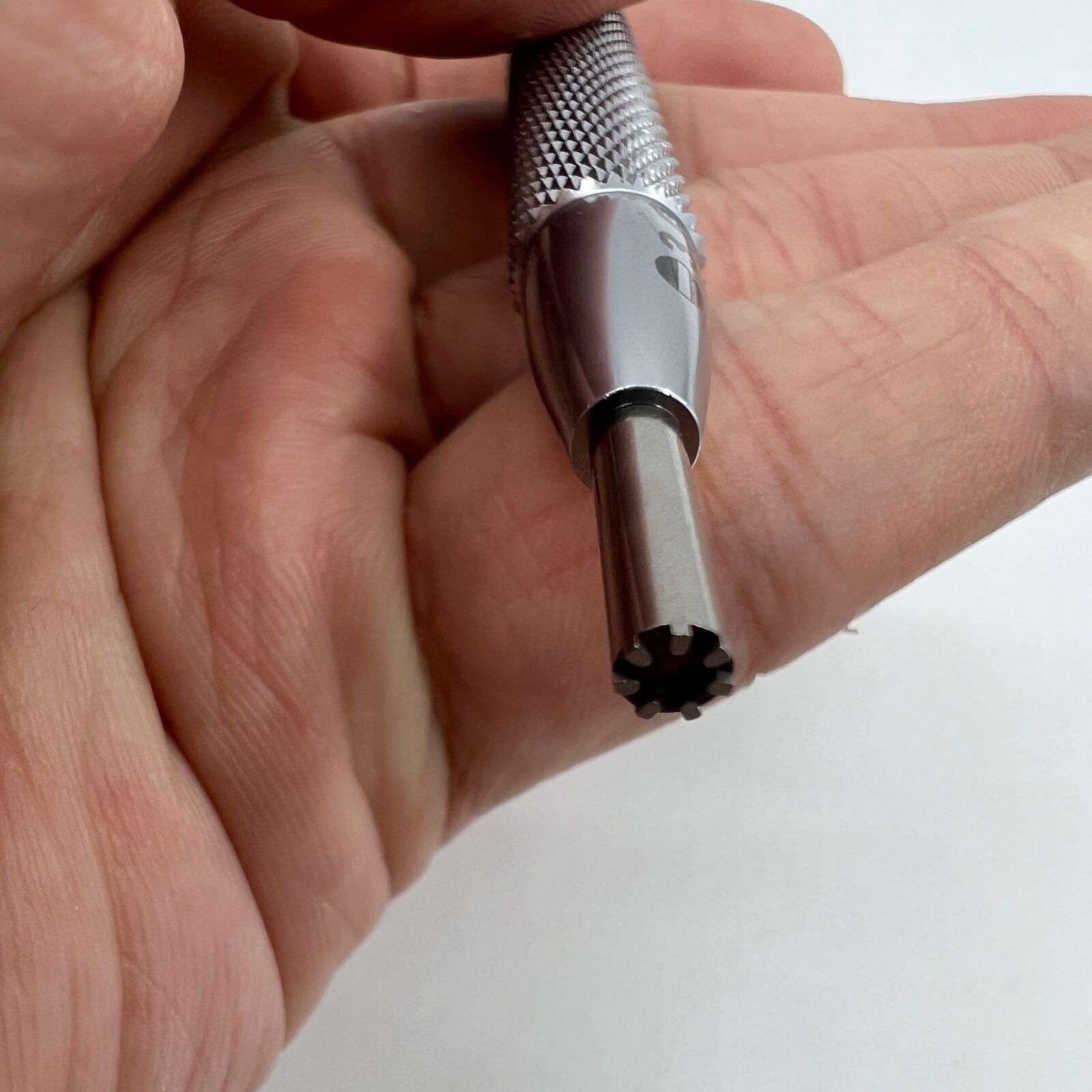 Watch movement tool with oscillating weight rotor screwdriver, ideal for Omega 8800 repairs and adjustments.