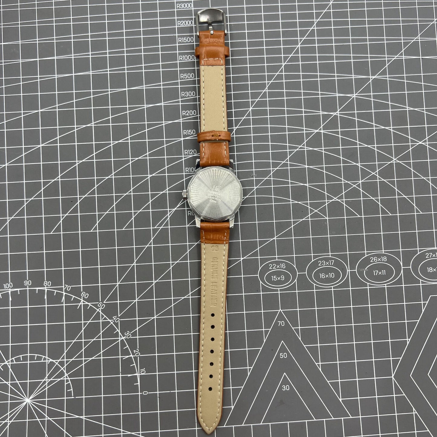 32mm Shanghai Factory manual mechanical watch with silver case and classic silver hour markers.