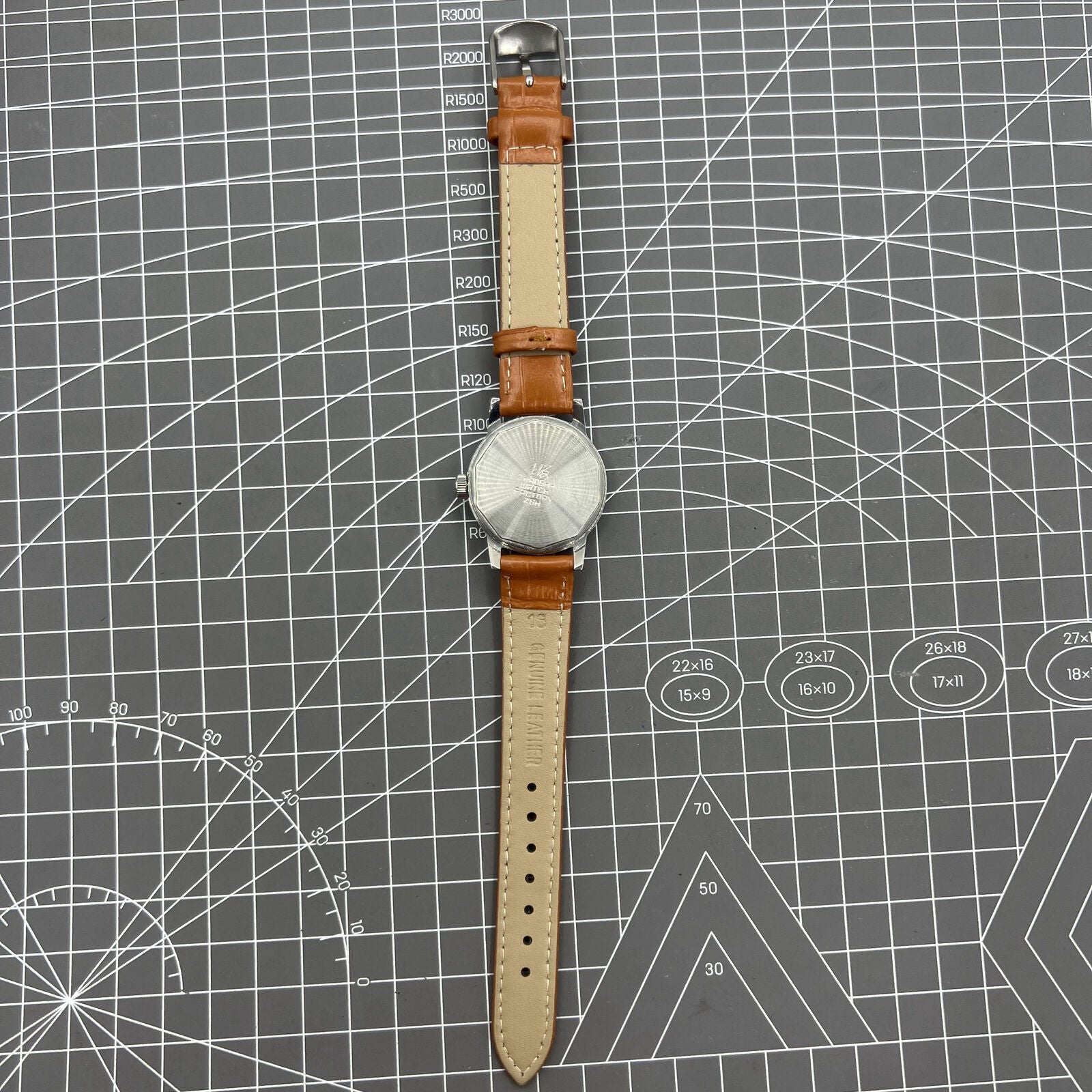 32mm Shanghai Factory manual mechanical watch with silver case and classic silver hour markers.