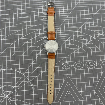 32mm Shanghai Factory manual mechanical watch with silver case and classic silver hour markers.