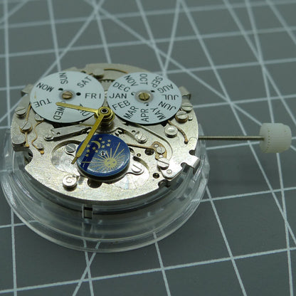 Automatic mechanical watch with silver case, week and month display at 12, moon phase at 6.