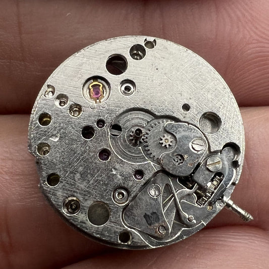 1. Close-up of 7121 3121 automatic mechanical watch movement for repair practice by China Made.  