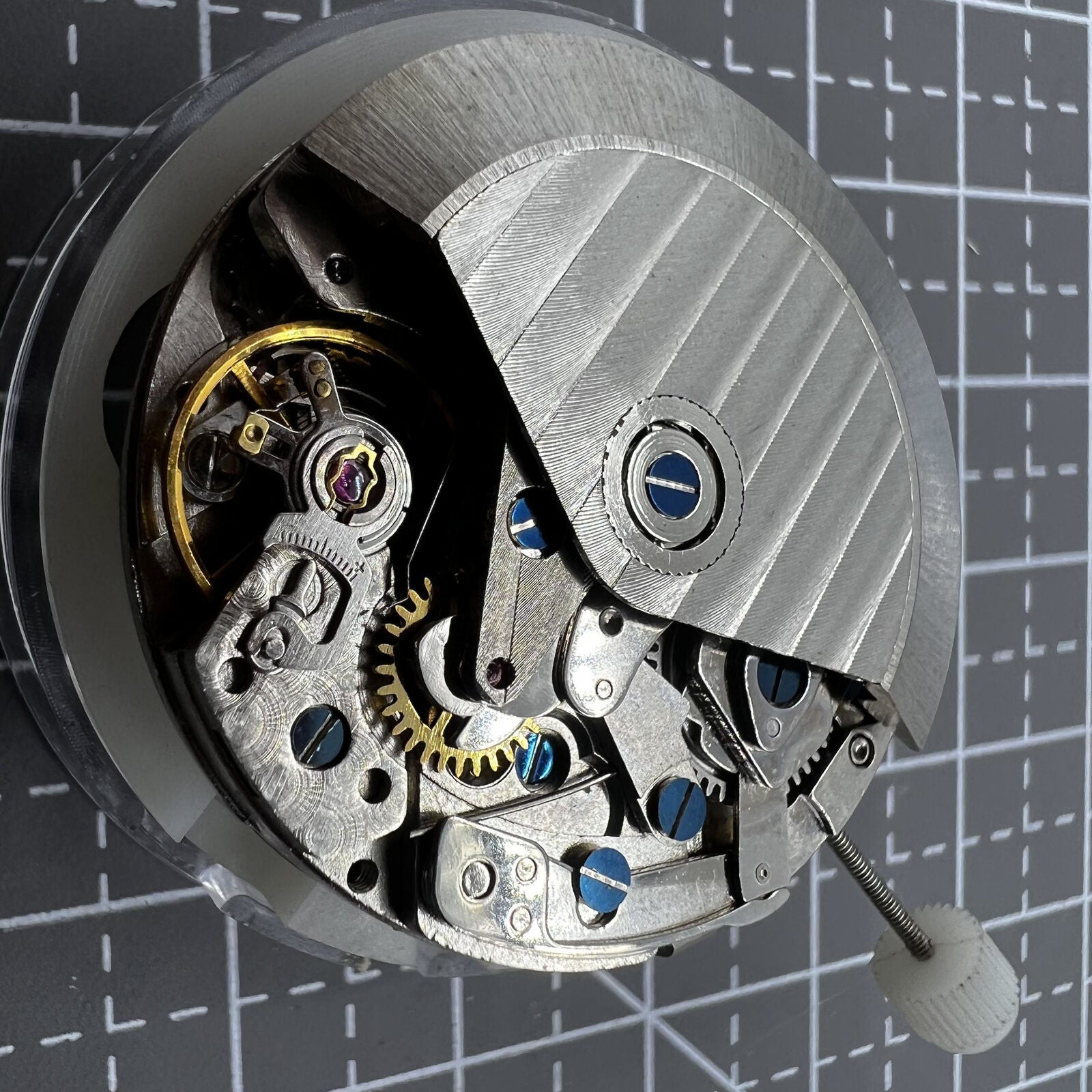 Close-up of ETA 7750 automatic chronograph movement with single calendar, showcasing precision watch accessory details.