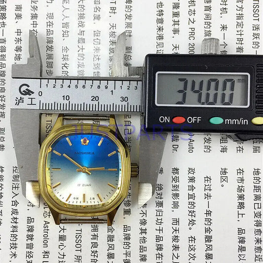 Shanghai 33 mm manuelle mechanische Uhr, goldener Nagel, blaues Zifferblatt, quadratisches Gehäuse, 17 Juden