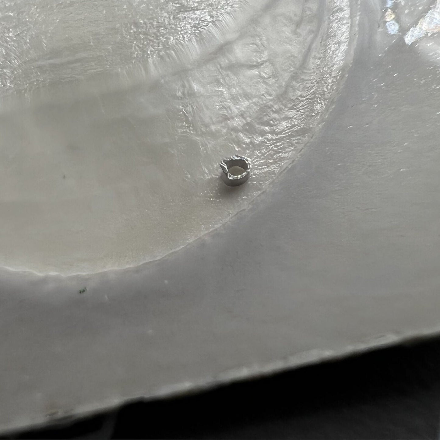 Setting wheel for RLX2235 automatic watch movement, generic replacement part for smooth time adjustment.