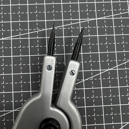 Swiss Bergeon 6618 spring bar plier tool for precise watch strap adjustments and repairs.