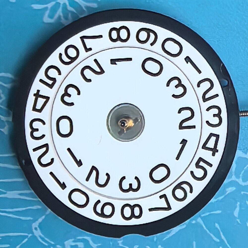 Swiss Made Ronda 519 quartz watch movement with white disk, ideal for precise timekeeping and replacements.