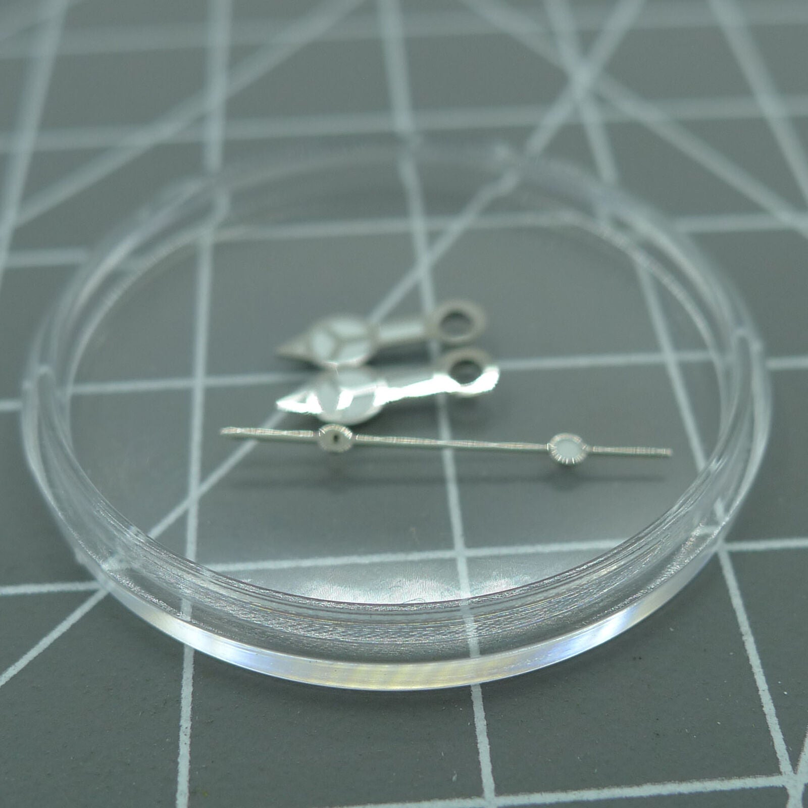 Silver trim green luminous watch hands for Seiko NH35A/NH36A movement, enhancing readability and style.