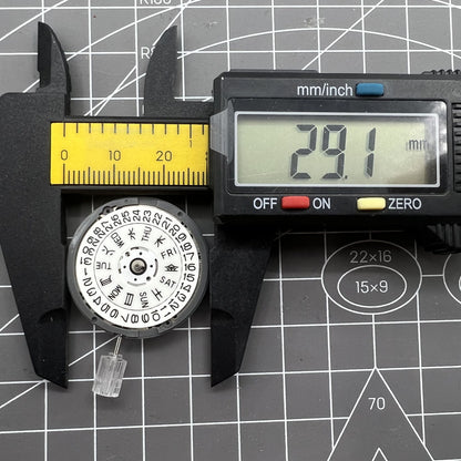 Seiko NH36A watch movement with white dial and blue lume, featuring 3/3.8 crown positions for precision.