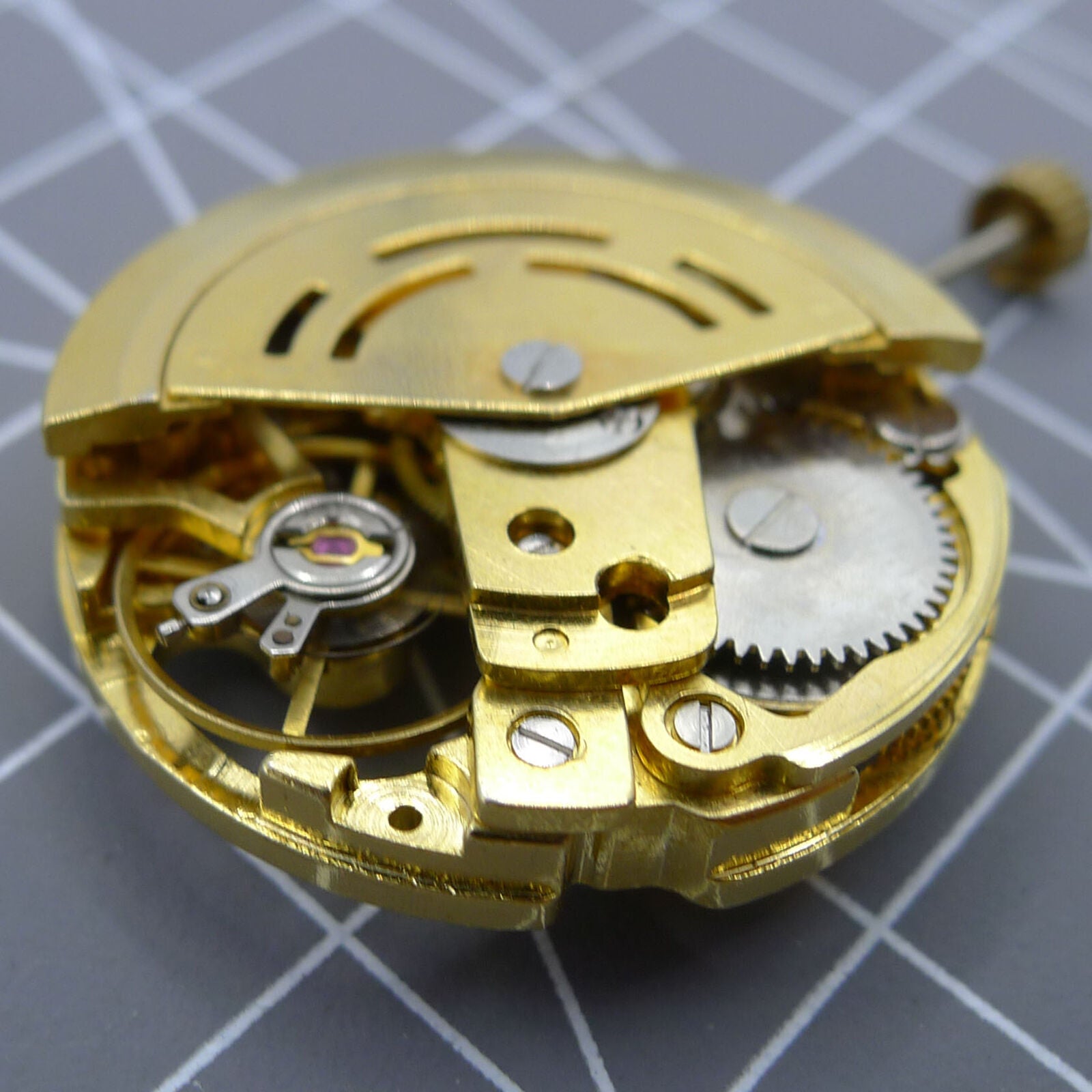 DANDONG 26.5mm 7120 automatic watch movement with hollow golden design for precise mechanical timekeeping.