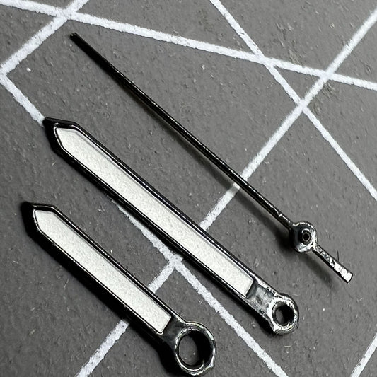 Luminous black trim watch hands for Miyota 2035 quartz, offering clear visibility and sleek design.