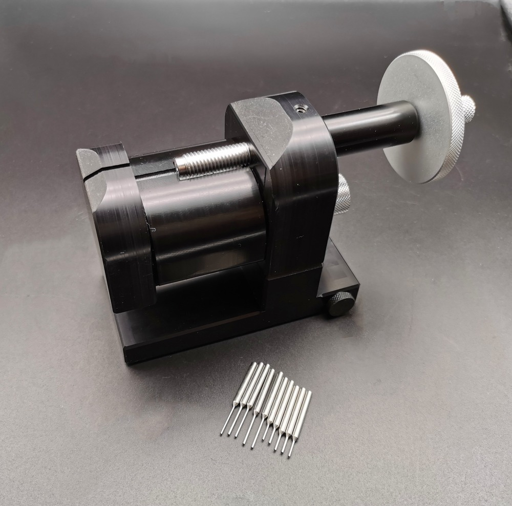 Adjustable watch strap link pin remover tool for precise bracelet chain adjustments.