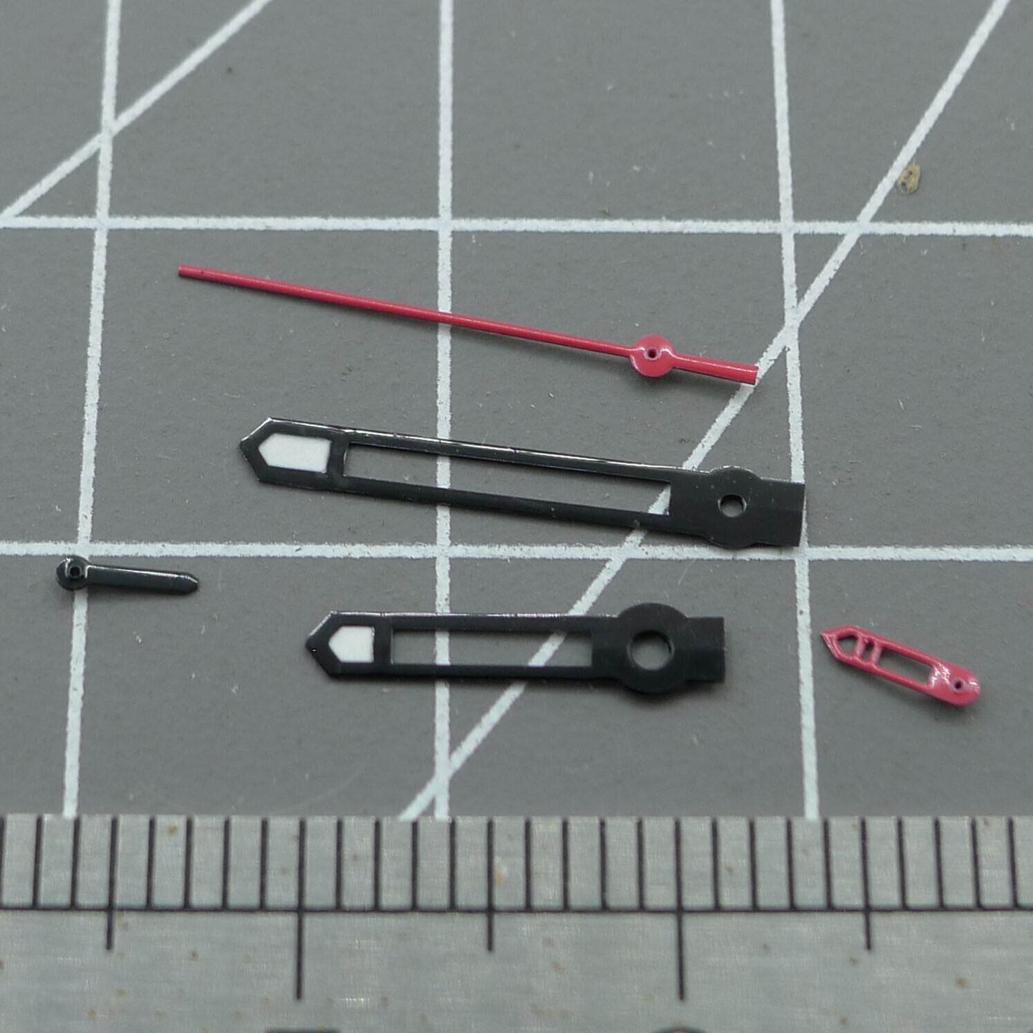 Red second hand with black trim for Hattori Epson VD53 quartz watch movement, precise accessory for repairs.