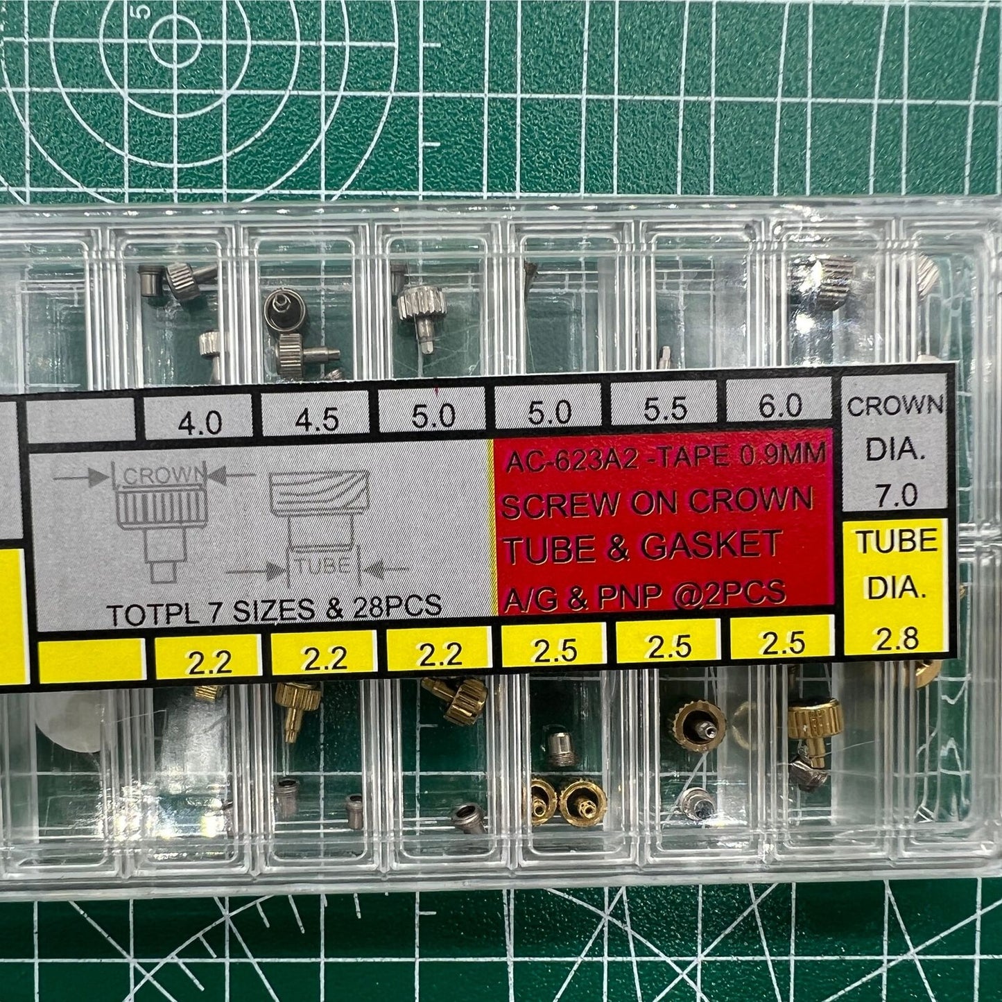 Wholesale stainless steel watch crown with silver and golden finish, screw-on tube and gasket, durable brand accessory.