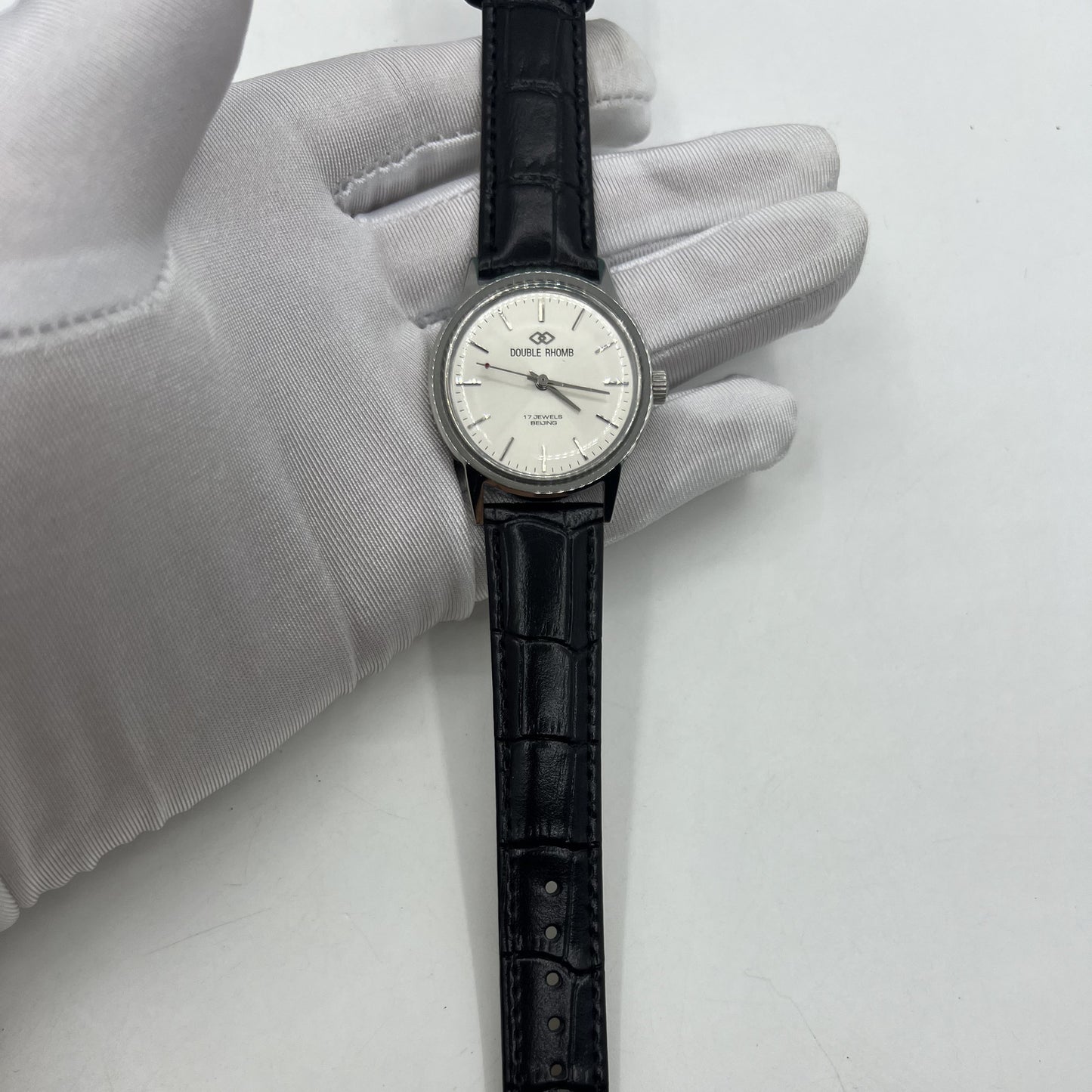 Beijing 36mm Double Rhomb watch with silver case and manual mechanical movement, showcasing silver hour markers.
