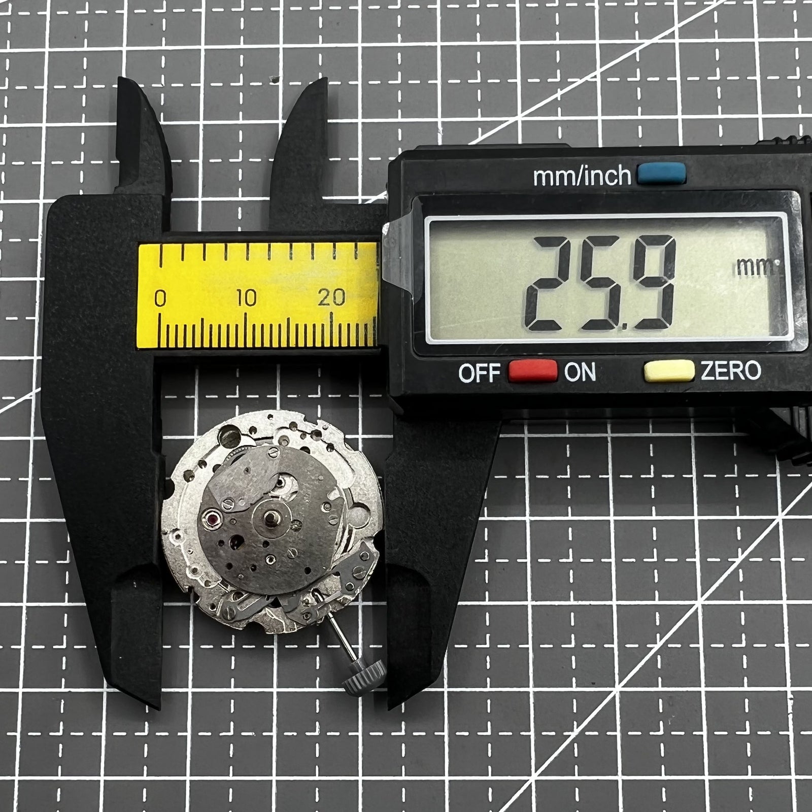 Miyota 8245 silver automatic watch movement showcasing Japan-made precision mechanical mechanism.