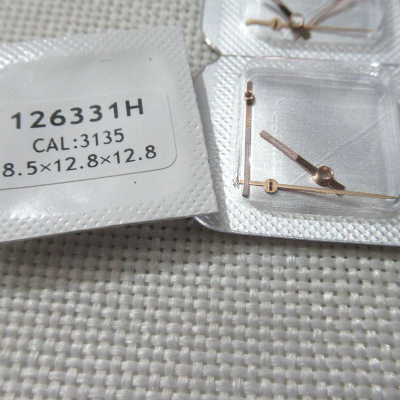 Luminous hour, minute, and second hands set for 3135 movement, enhancing watch visibility.