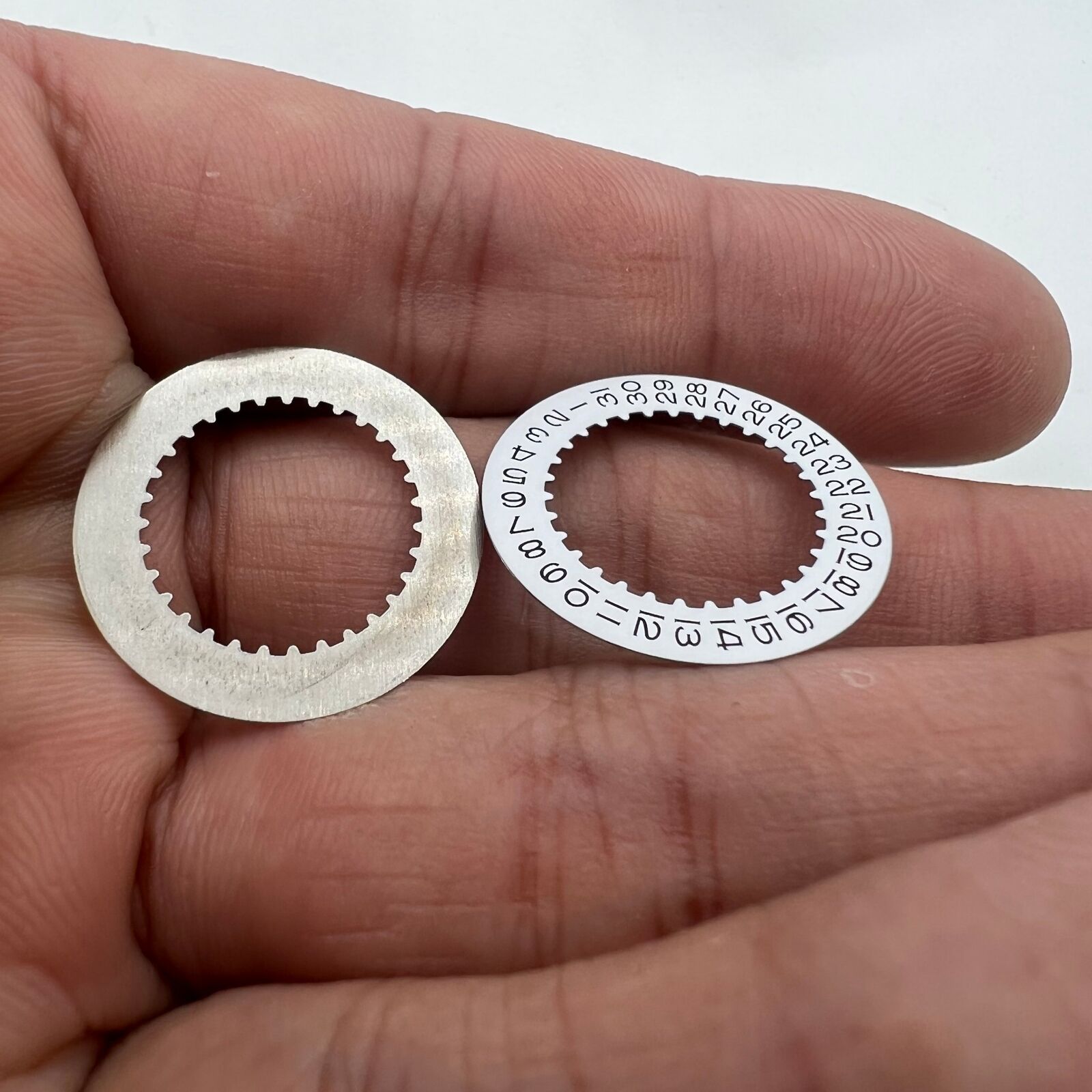 White date disk wheel for RLX 3235 movement, precision replacement for Rolex watch repair.