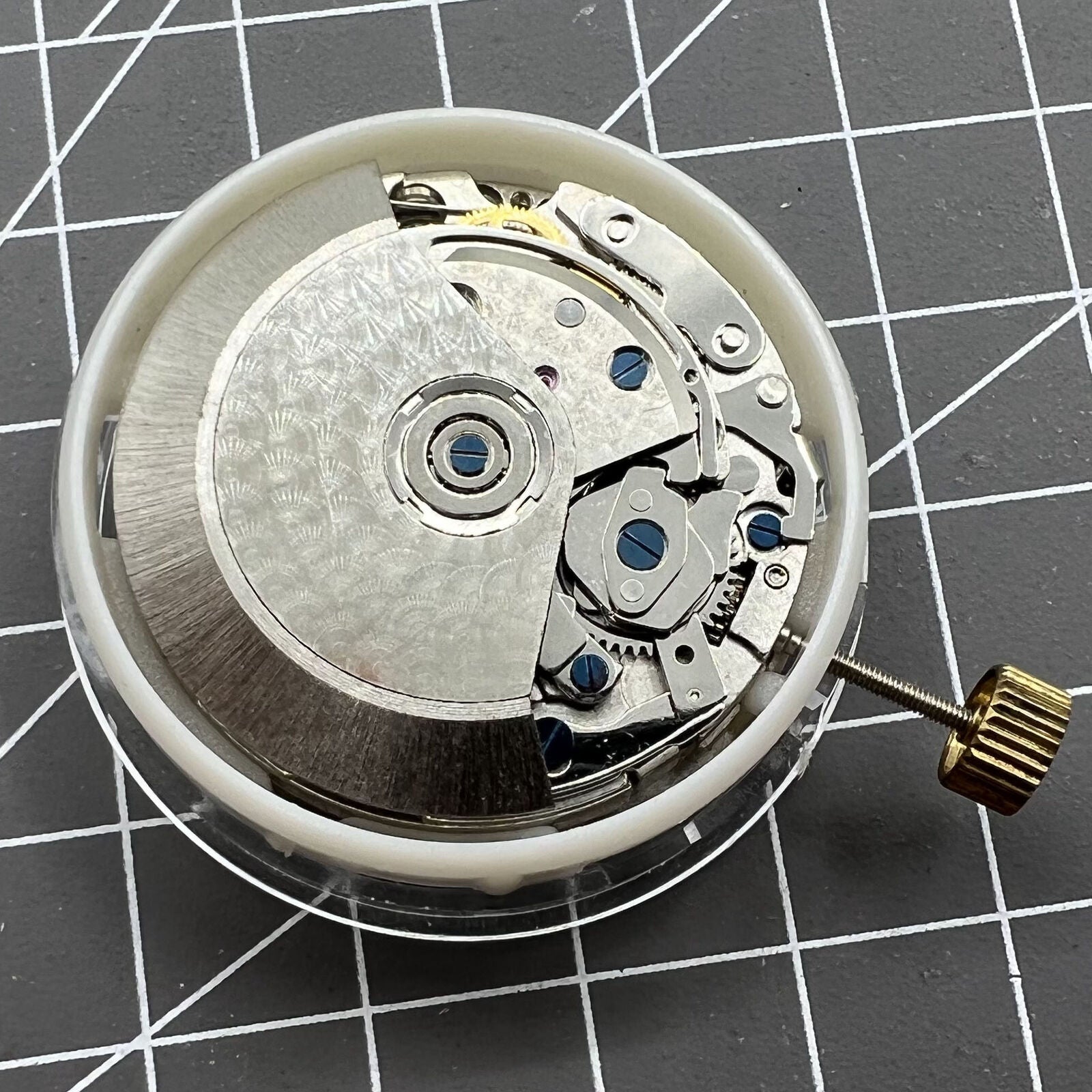 Asia Made 7750 mechanical watch movement with black dial, calendar, and three small second subdials at 3, 6, and 9 o'clock.