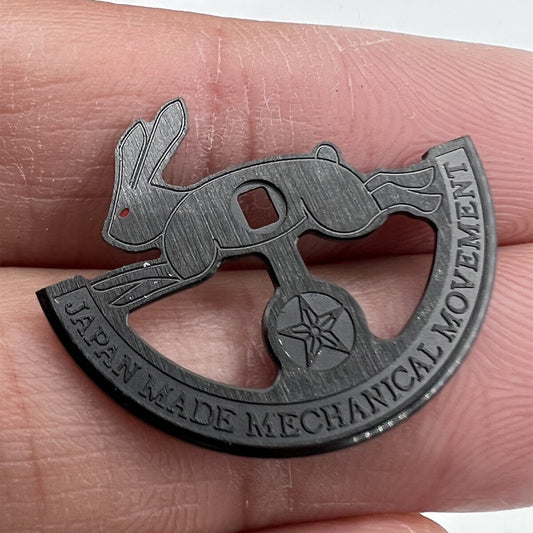 Black hollow rabbit-shaped rotor weight for Miyota 8215 watch movement, enhancing winding efficiency.