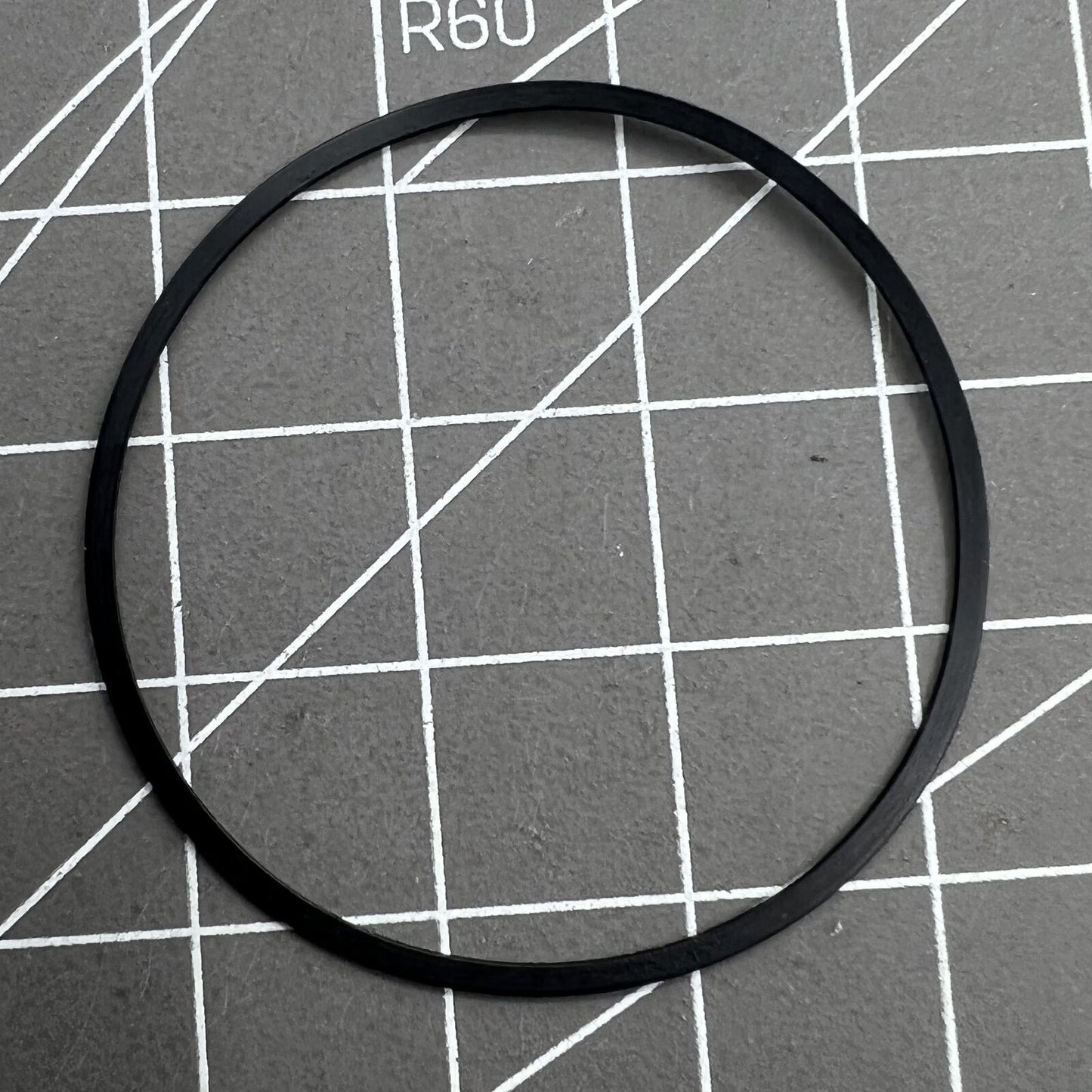 Citizen Eco-Drive H504 watch gasket O-ring sealing the quartz movement back case for water resistance.