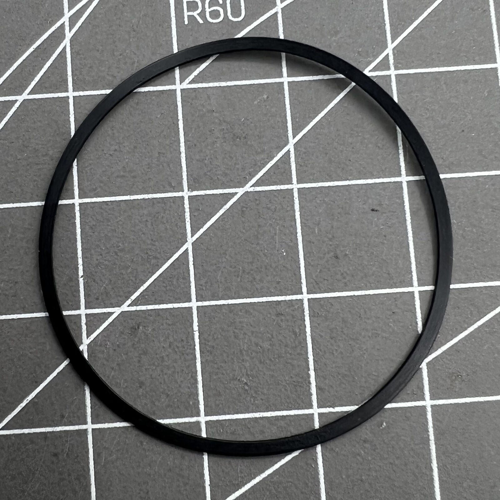 Citizen Eco-Drive H504 watch gasket O-ring sealing the quartz movement back case for water resistance.