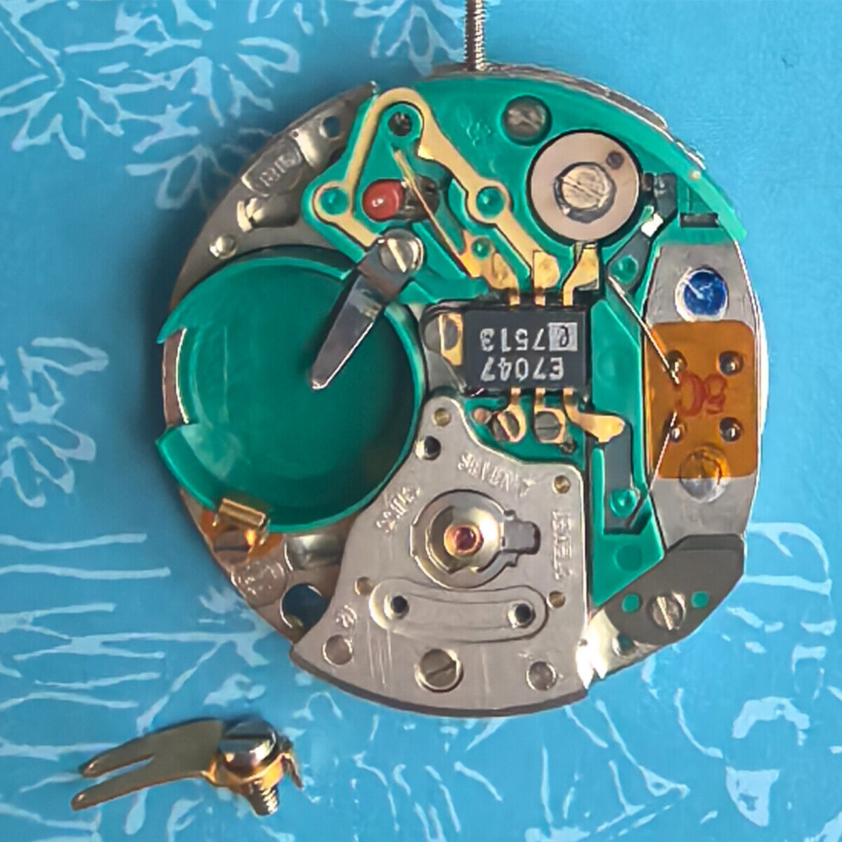 Swiss Made ESA9181 quartz watch part with silver finish, double calendar, and 3 hands for watch repair.